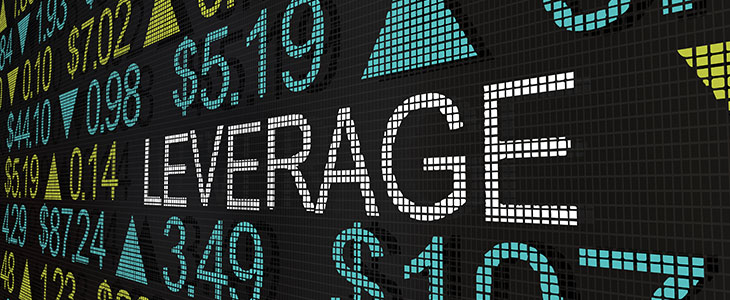 a big screen with prices going up or down and the word leverage representing leverage and margin