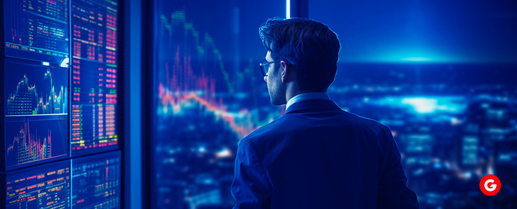 A trader examines a board adorned with charts, a crucial part of their meticulously crafted trading plan.