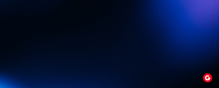 A vibrant blue light shines against a solid black background, highlighting the intensity of the color.