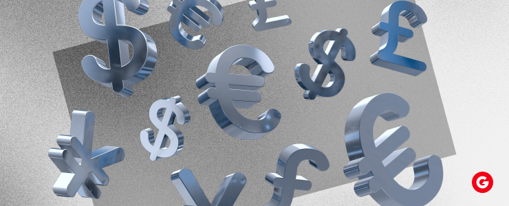 A metal sign displaying a dollar sign, euro sign, and pound sign, representing CBDCs and fx pairs.