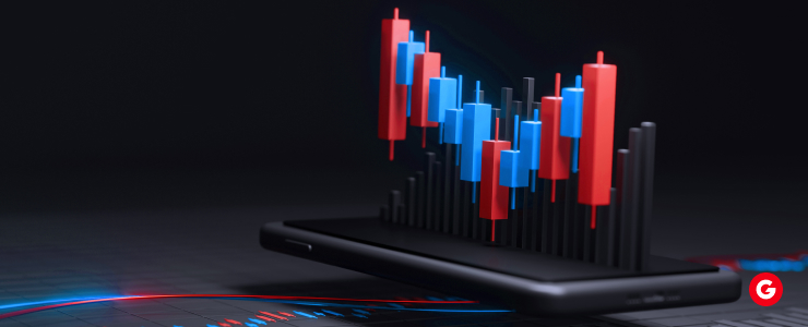 Smartphone displaying a red and blue bar graph illustrating tight spreads in data analysis.
